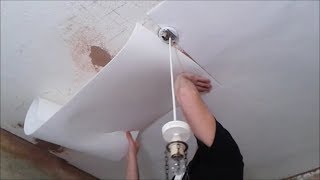 Applying Insulating Lining Paper To Ceiling [upl. by Carbrey940]